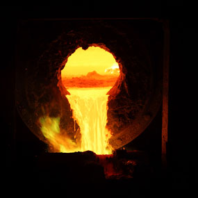 Close up of melted copper being poured